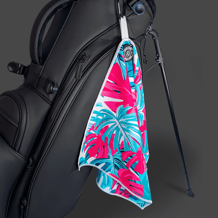 A magnetic microfibre golf towel on a golf bag