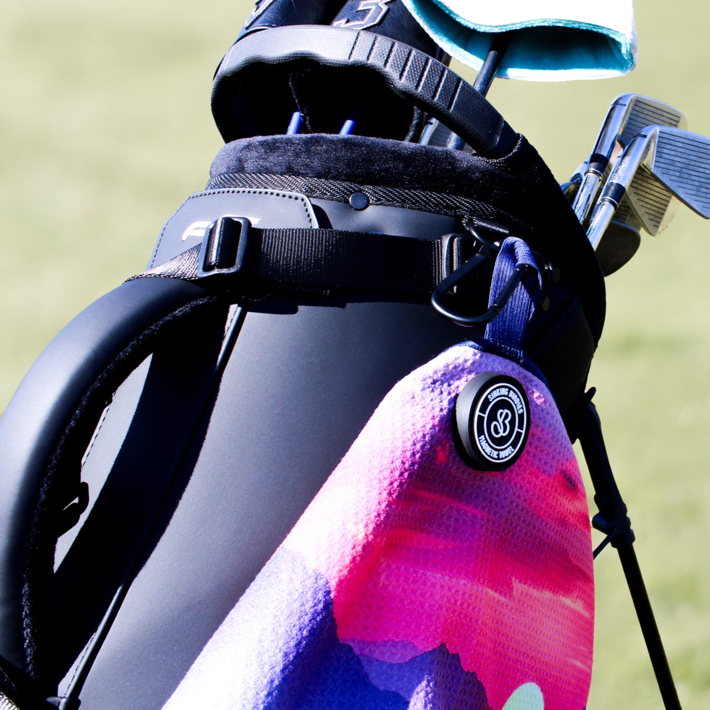A magnetic golf towel on the golf course